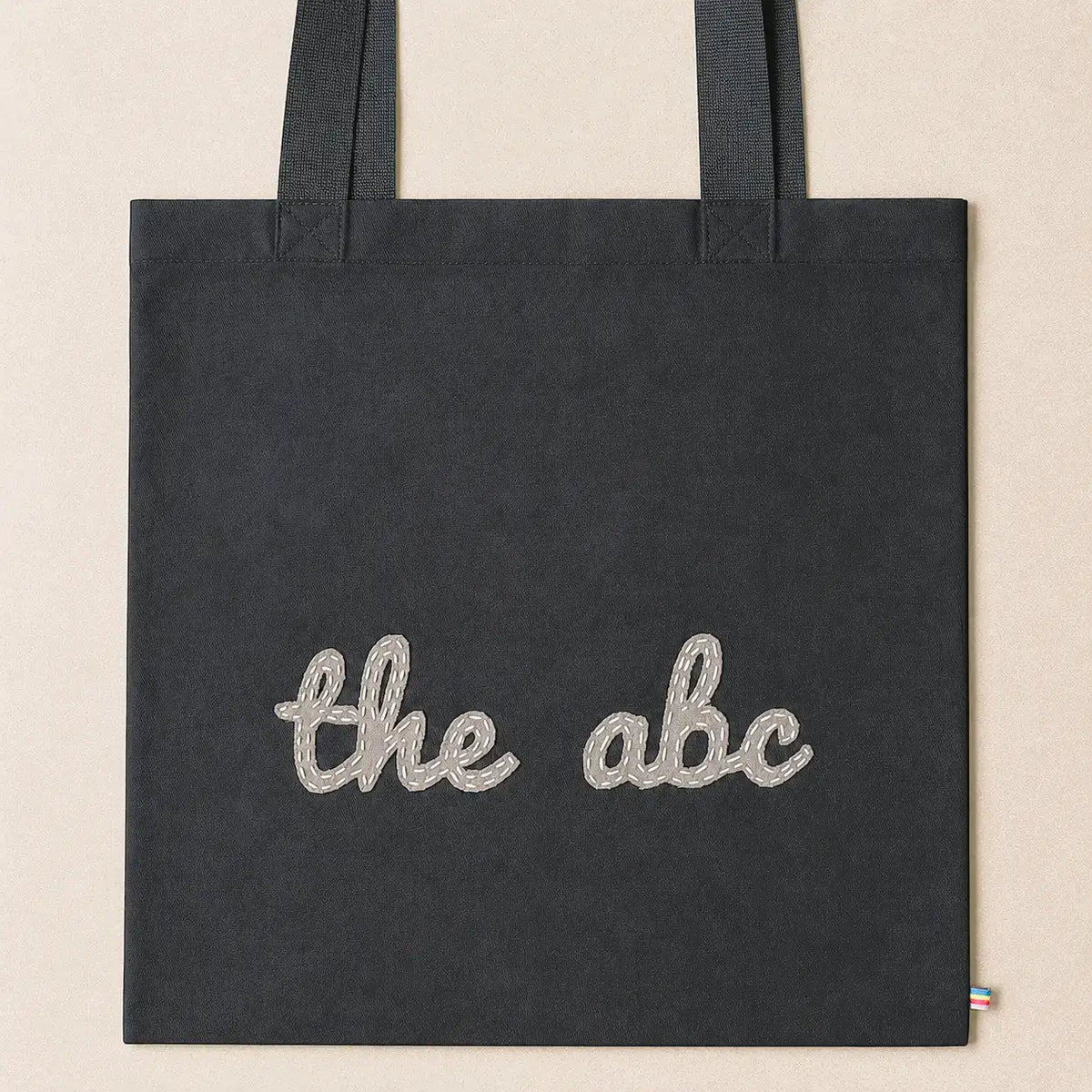 Dotted theabc logo tote bag