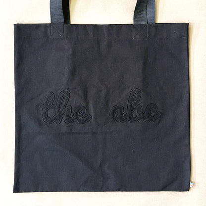 Flat theabc logo tote bag