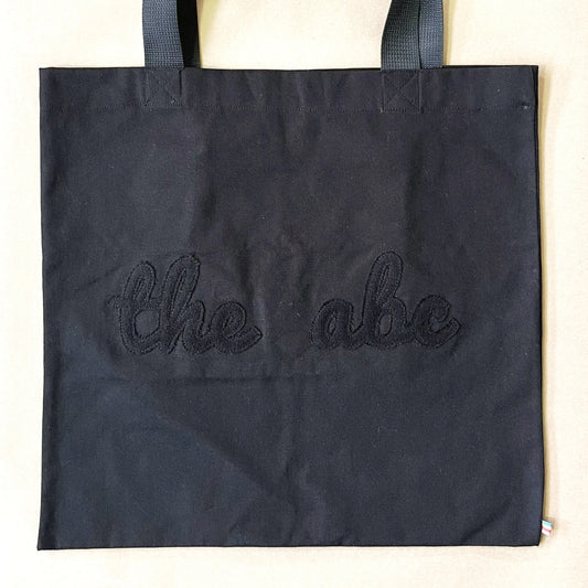 Flat theabc logo tote bag
