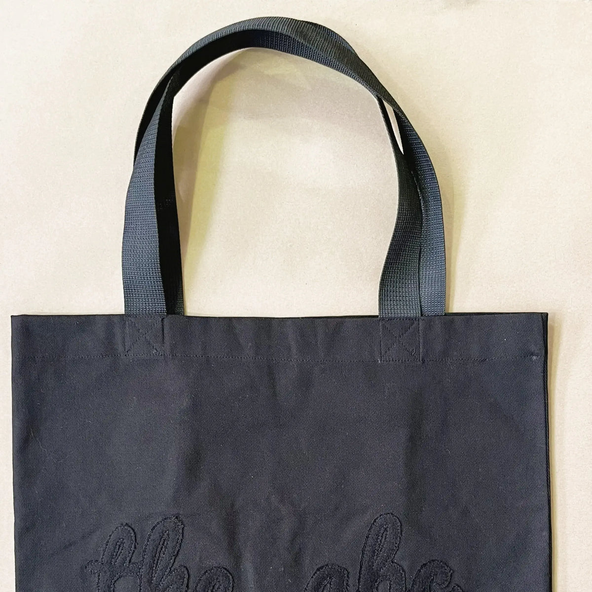Flat theabc logo tote bag