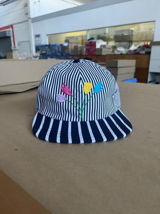 Cap with pin stripe embroidered tulip flower in ABC colours